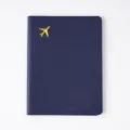 Dark blue PVC passport holder with gold airplane pattern, durable travel document cover protector. - Passport Book / Dark Blue