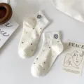 Women white cotton short socks with colorful polka dots and cute embroidered heart detail. - 35-40 / White