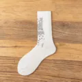 White mid-calf cotton socks featuring a classic black paisley pattern design for everyday wear. - 36-44 / Double Needle Paisley - White