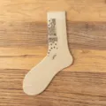 Beige cotton crew socks featuring a stylish paisley print pattern, comfortable and breathable. - 36-44 / Double Needle Paisley Beige