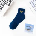 Dark blue cotton short socks featuring yellow Good smiley embroidery for casual wear and sports. - 36-43 / Good Smiley Face Socks - Navy Blue