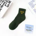 Dark green cotton short socks featuring a yellow Good smiley embroidery for casual daily wear. - 36-43 / Good Smiley Face Socks - Dark Green