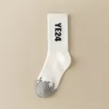 White high tube casual sports socks featuring YE24 letters and grey flame toe pattern. - 36-43 / YE24 White
