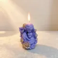 Purple scented candle featuring a mother and child hugging design with gold roses for home decor. - Hand Painted Mother and Child Floral / Box Size 7x7x10cm / Purple