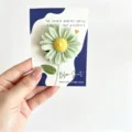 Green daisy scented candle on card packaging, sweet floral aroma gift and desktop decor. - Daisy Style Green Flower (Fresh Green Tea)