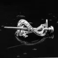 Detailed close-up of the vintage Viking Celtic dragon metal hair pin, retro silver hair fork. - D-270