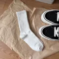 White ribbed mid-calf crew socks for women and men, classic daily casual solid color hosiery. - One Size / White