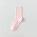 Pink ribbed mid-calf cotton socks featuring a delicate silver bow embroidery detail. - One Size / Double-Needle Bow Embroidery Pink