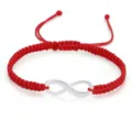 Handmade red braided rope bracelet featuring a silver infinity symbol for couples - Red