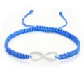 Hand-woven blue friendship bracelet with silver infinity symbol and adjustable flat knot - Blue