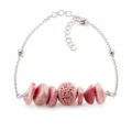 Elegante bracciale in rodonite rosa naturale e pietra lavica per aromaterapia - Rodonite