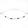 Bracciale a corda intrecciata bianca fatto a mano con perline oro nere e bianche - Bianco
