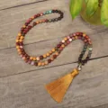 Detail of 108 natural stone mala beads necklace featuring a long golden silk tassel - Natural Stone Tassel Style (2961)