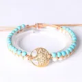 Handgemaakte Tree of Life yoga armband met turquoise kralen en gouden stalen hanger - Wit Groene Turquoise Goud Roestvrij Staal