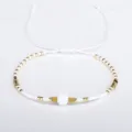 Minimalist Bohemian Miyuki bead bracelet with white semi-precious stone and golden accents - White
