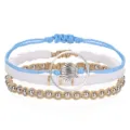 Handmade bohemian woven bracelet set with white Heishi beads and silver seashell charm - Shell Style (3525)