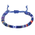Hand-woven ethnic style bracelet with colorful geometric patterns on blue cotton rope - 2-Dark Blue Multicolored