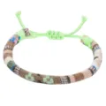 Hand-woven ethnic style bracelet with colorful geometric patterns and adjustable knot - 7-Vintage Geometric