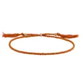 Handgefertigtes orangefarbenes Baumwollarmband mit Kupferperlen und Quasten - Braun