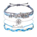 Handgefertigtes Wachsfaden-Armband-Set mit Berg- und Kompassanhängern in Blau und Weiß - Kompass-Stil