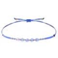 Bracciale in corda blu intrecciato a mano con perline da 2mm e pietre blu sfaccettate - Blu zaffiro
