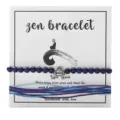 Handmade Lapis Lazuli Zen bracelet set with blue waxed threads on display card - Lapis Lazuli