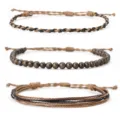 3-piece set of handmade braided wax cord bracelets with tiger eye beads in earthy tones - Three-Piece Set / Bronzite