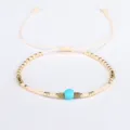 Handmade Bohemian Miyuki seed bead bracelet featuring turquoise stone and hematite beads - Beige
