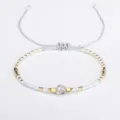 Handmade white Miyuki bead friendship bracelet with gold accents and semi-precious stone - Gray