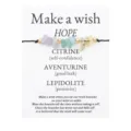 Handmade wish bracelet with natural aventurine and citrine stone beads on white card - Crushed Stone (3714) / Purple/Green/Yellow