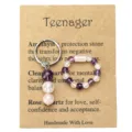 Detail view of handmade natural crystal bead ring and keychain set on a display card - Ring And Keychain And Card