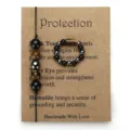 Close-up of handmade tiger eye and hematite beaded bracelet and ring gift set on card - Bracelet And Ring Set (With Card)