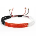 Pulsera bohemia hecha a mano con cuentas de semillas multicapa en negro naranja y blanco - Negro Rojo Blanco