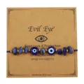 Handgefertigtes blaues Evil Eye Armband mit Natursteinen auf Kraftpapier-Karte - Blau