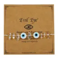 Handgefertigtes Evil Eye Armband mit klaren Rohsteinen und goldenen Kupferperlen - Weiß