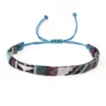Handgefertigtes ethnisches Webarmband mit Nepal-Muster und blauem Kordelzugverschluss - Stil 3