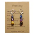 Asymmetrische Naturstein-Ohrringe mit Lapislazuli, Amethyst und Tigerauge auf Kraftkarte - Lapis Amethyst Tigerauge Set (3834) / Blau-Lila-Braun Töne