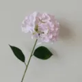 Close-up of 3D printed artificial pink hydrangea flower with realistic green leaves - Light Pink