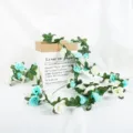 Künstliche Rosen-Girlande in Cyan und Weiß für Hochzeiten und Event-Dekoration - 45 Köpfe / Blau und Weiß