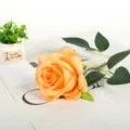 Artificial orange rose flower single stem with green leaves for home wedding decor photography prop. - Orange