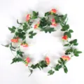 Künstliche rosa Rosengirlande für Hochzeitsdeckendekoration und Einkaufszentren - 10 Köpfe / Orangerosa