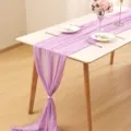 Elegant lavender chiffon table runner draped over a white table for banquet wedding decor - Light Purple / 70-600cm