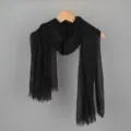Solid black cotton linen crinkle scarf with frayed edges hanging on a wooden hanger. - 90*180cm / 13# (Black)