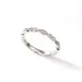 Close-up of S925 sterling silver geometric ring with sparkling high-carbon diamonds - Size 5 / White Gold