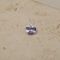 Macro detail of a faceted cushion cut lavender zircon birthstone on textured surface - June-Pendant Only (Without Chain)