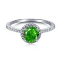 Macro detail view of an S925 sterling silver ring featuring a green gemstone - Size 8 / Round Solitaire / Emerald