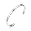 Detailed close-up view of a minimalist 925 sterling silver cuff bracelet with embedded stones - Rhinestone Style / Width 4mm - Circumference 16cm