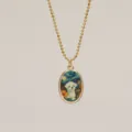 Close-up detail of Van Gogh Starry Night dog art pendant on gold ball chain necklace - Dog