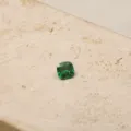 Close-up of a cushion-cut green zircon gemstone for birthstone jewelry - May-Pendant Only (Without Chain)