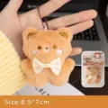 Lindo llavero de oso de peluche marrón con lazo blanco y cadena de cuentas accesorio - 酷酷小棕熊